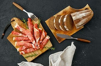 Overhead view of rolled slices of jamon
