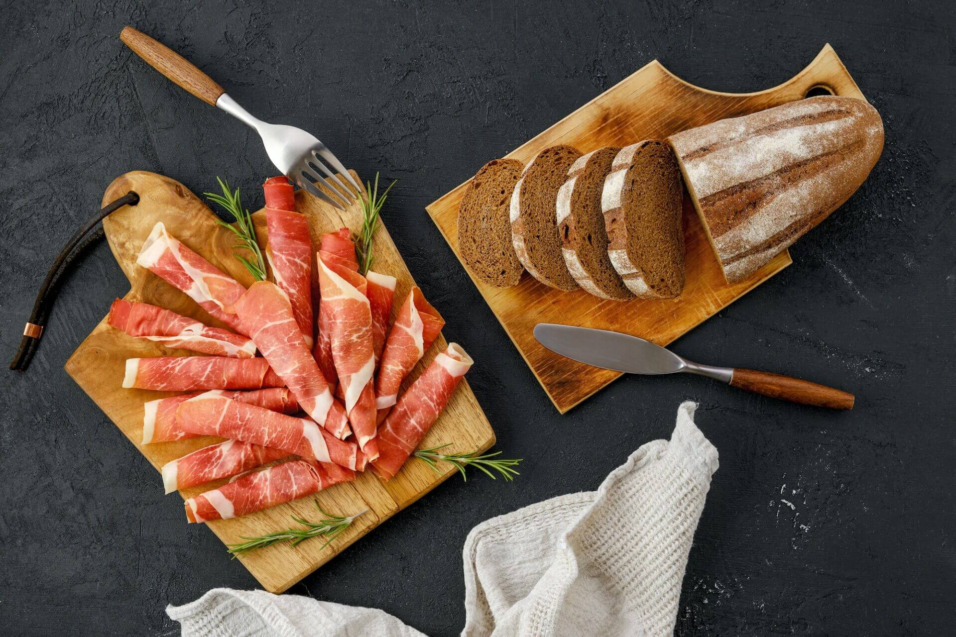 Overhead view of rolled slices of jamon